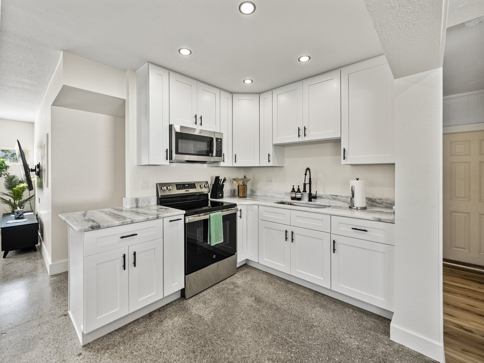 Kitchen — range wall after renovation
